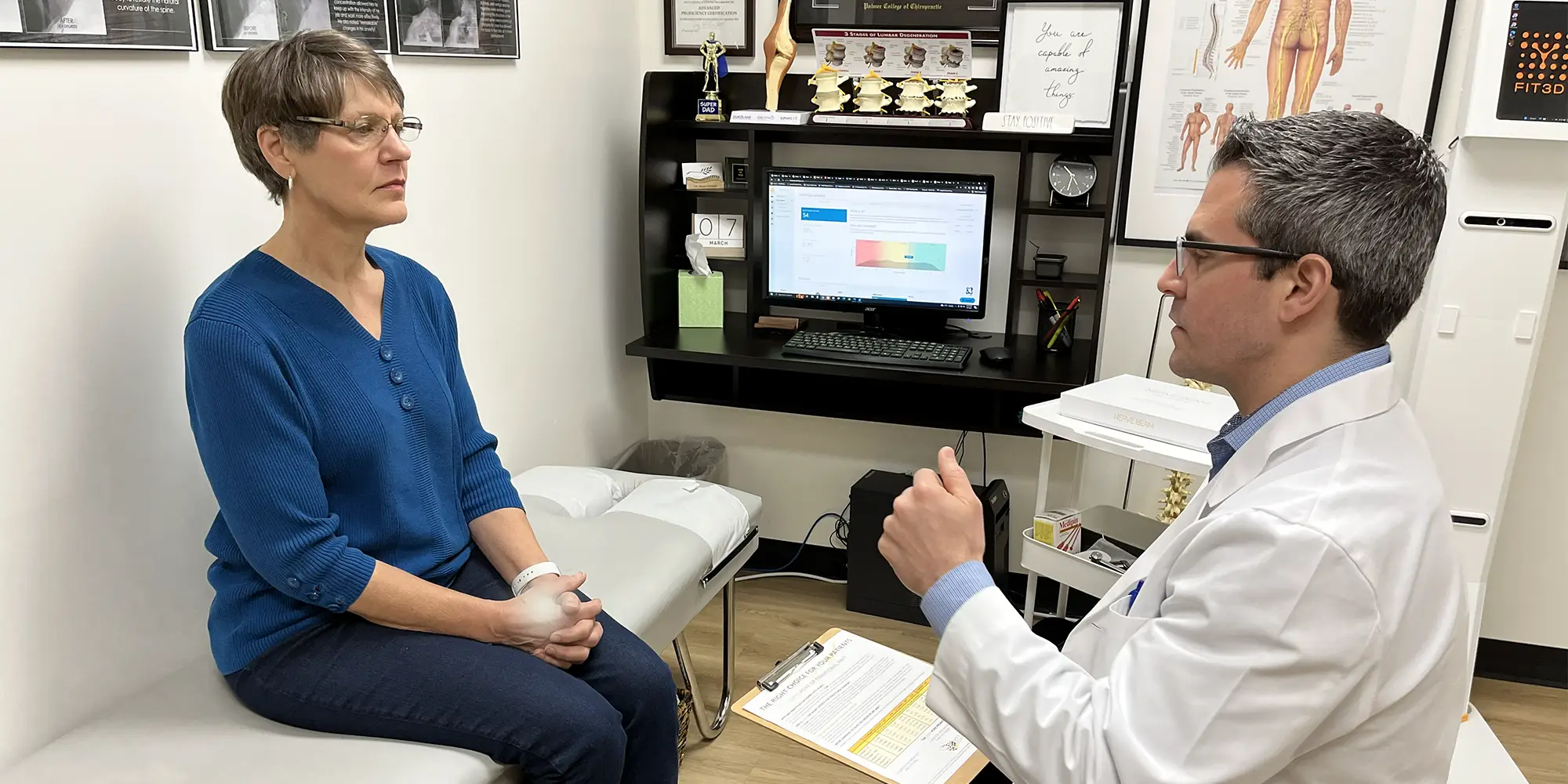 Neuropathy Davenport IA Woman Consulting with Doctor